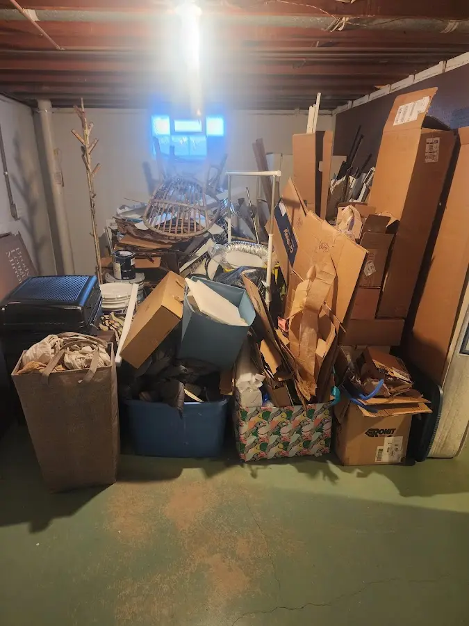 Roll-off dumpster container at job site for 2 Yard Dumpster Rental in Brookfield